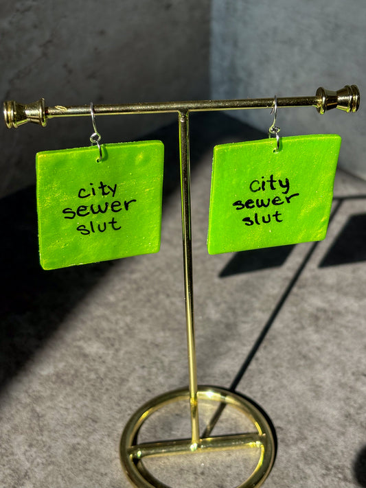 brat city sewer slut square polymer clay earrings