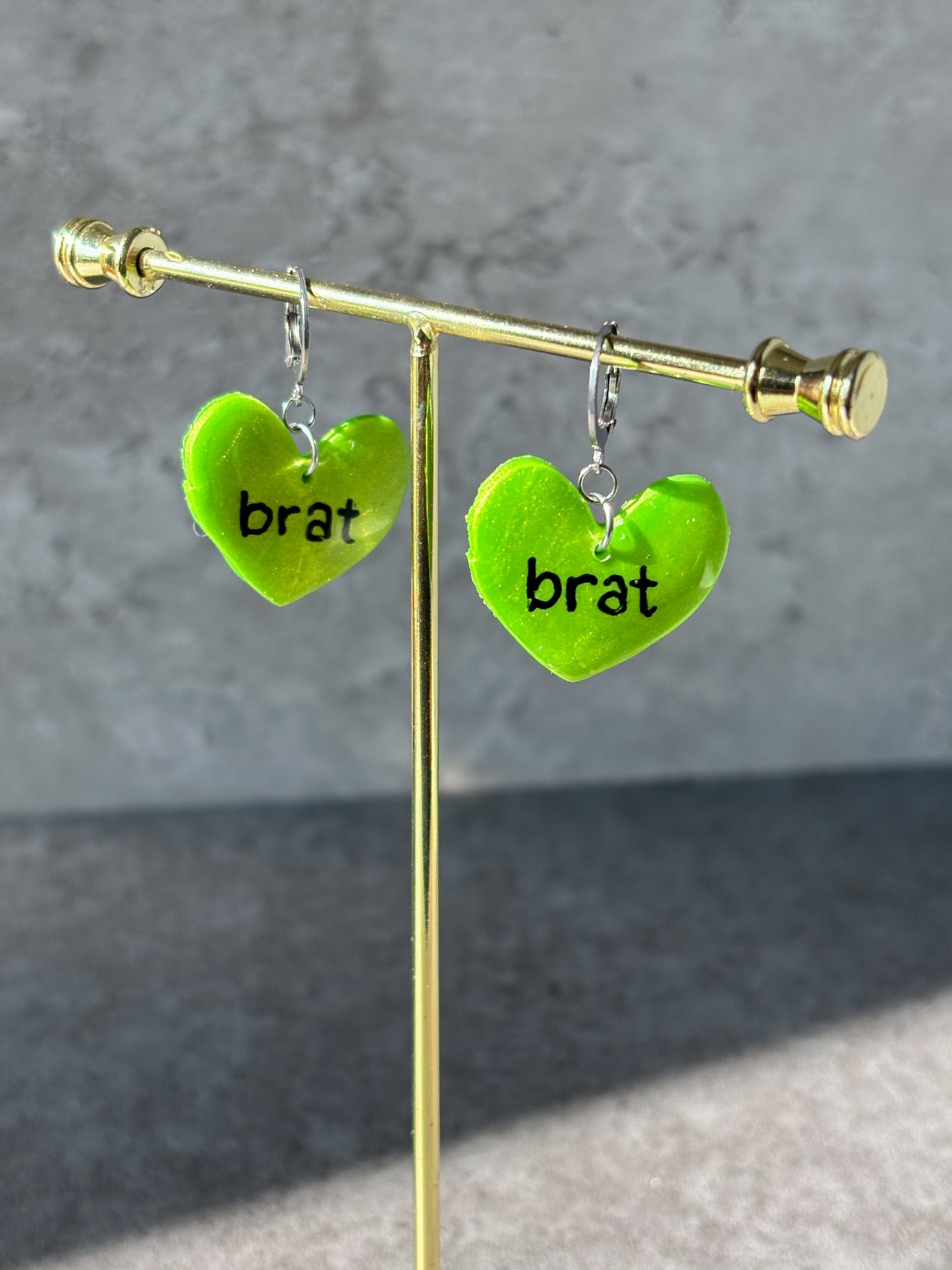 brat green heart earrings