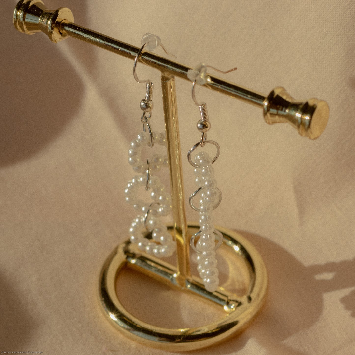 Dangle Pearlescent Stacked Heart Earrings